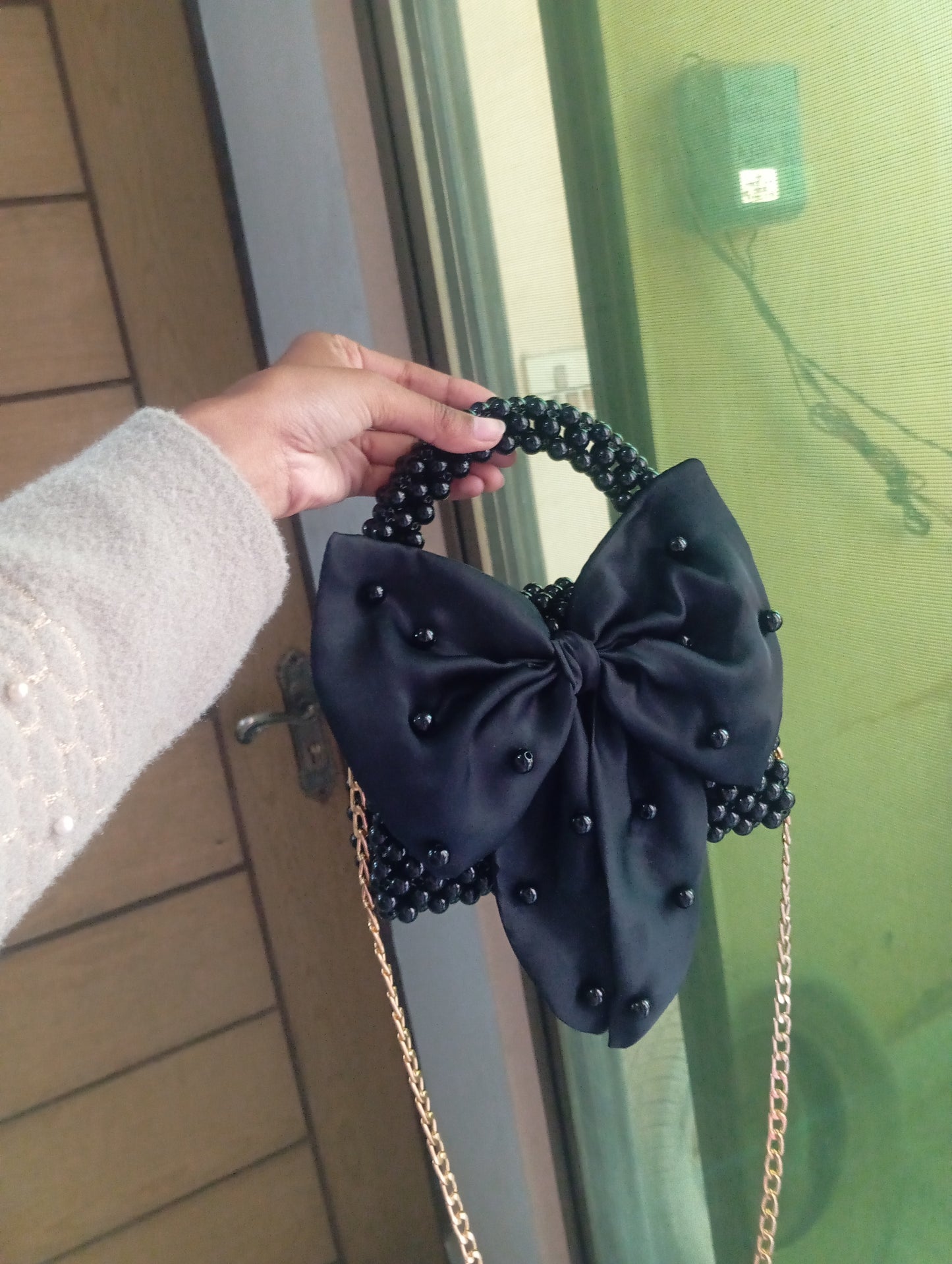 Beaded bag with bow