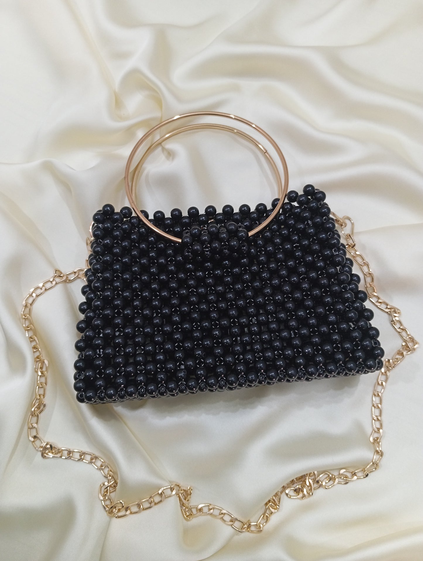 Pack beaded bag with golden handle