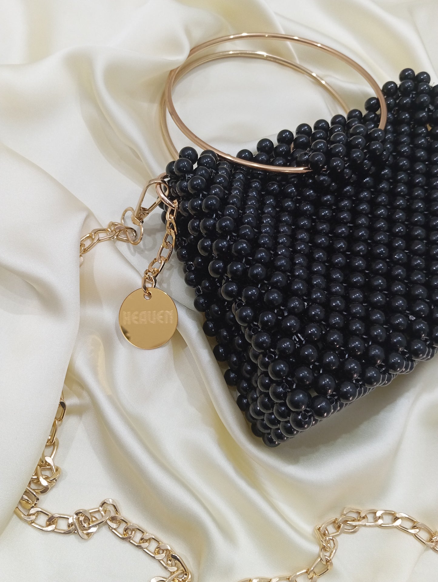 Pack beaded bag with golden handle